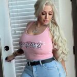 Queen Tracy Biography